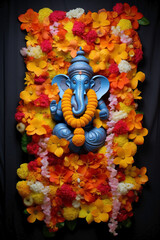 Journeying through Dewali with Blue Ganesha surrounded by flower garlands in a vertical shot.