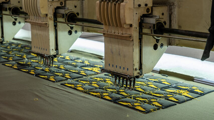 border machine at work making logo design