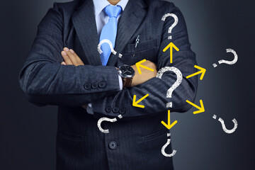 A businessman with his arm cross with question mark icon represents a business problem and has the knowledge and ability to solve it successfully or alternative way of working and solving problem.