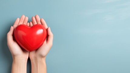 Obraz premium hand holding red heart, love passing