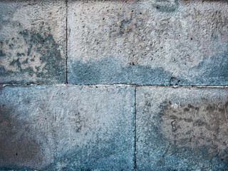 Light old medievil stone wall texture with blue patterns