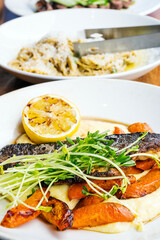 Branzino Fish and Polenta, Housemade pasta,
 Calgary Downtown.Stampede Festival.Banff National Park, Canadian Rockies, Alberta, Canada...Banff National Park, Alberta, Canada