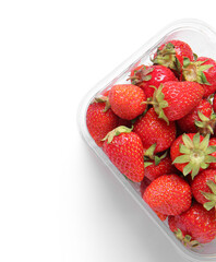 Plastic container with fresh strawberry on white background, closeup