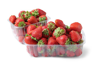 Plastic containers with fresh strawberry on white background