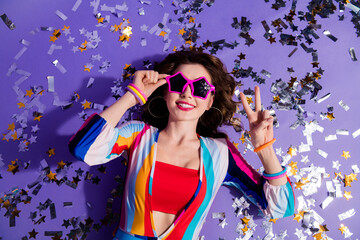 High angle photo of charming friendly lady wear striped overall dark star glasses showing v-sign...