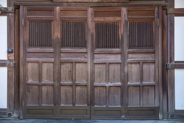 Keuken foto achterwand Oud gebouw closeup antique folding door asian style wooden door with grill for temple shrine entrance