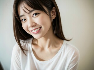 Fototapeta premium Portrait of a Beautiful Asian Japanese Girl 19-25 years old in white t-shirt , looks at the camera on White Background. generative AI
