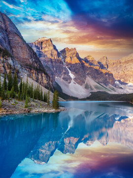 Sunrise at Moraine Lake during summer in .Banff National Park, Canadian Rockies, Alberta, Canada...Banff National Park, Alberta, Canada
