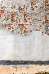 Textured wall of Brazilian colonial house. Mold, infiltration. Diamantina Houses