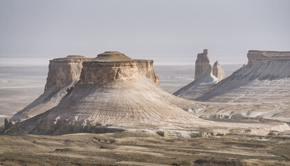 Panorama of hills and ridges with limestone and chalk slopes in the Kazakh steppe, relief folds in the desert tract of Boszhira - obrazy, fototapety, plakaty