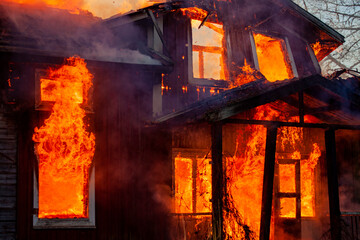 House on fire, heat, firemen, ash, smoke