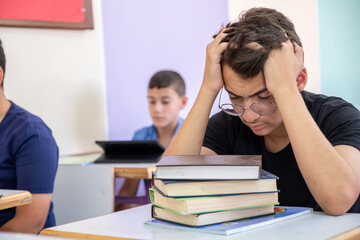 Student feeling frustrated due to the load of studying