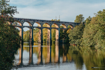 Railway Bridge with river in Bietigheim-Bissingen, Germany. Autumn. Railway viaduct over the Enz...