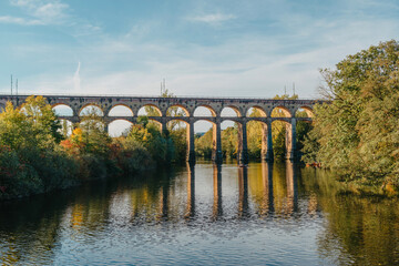 Railway Bridge with river in Bietigheim-Bissingen, Germany. Autumn. Railway viaduct over the Enz...