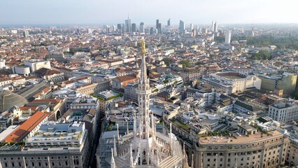 Europe, Italy, Milan - Aerial view of Piazza Duomo, gothic Cathedral in downtown center city. Drone...