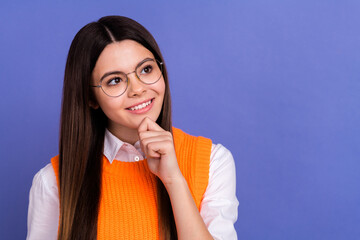 Portrait of adorable girl with long hairstyle stylish shirt in glasses thoughtfully look empty...