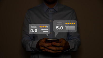 Close up on customer man hand pressing on smartphone screen with gold five star rating feedback...