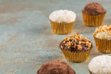 Brigadeiro is a common Brazilian dessert. Delicious chocolate candy Brigadeiro on a table