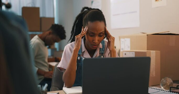 Woman stress, cardboard box and online order with delivery issue on laptop for small business. Burnout, headache and shipping courier for ecommerce and purchase with entrepreneur and anxiety at home