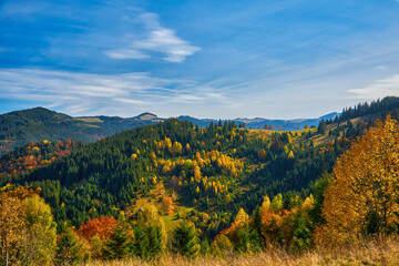 Autumn Morning in the Mountains: A Serene Village in the Valley Surrounded by Majestic Peaks