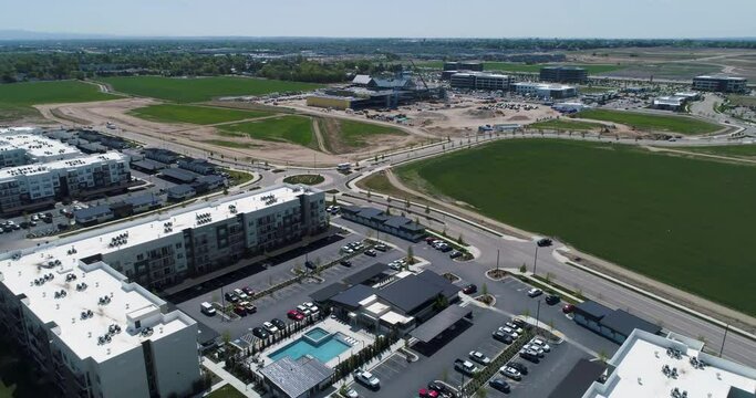 Aerial 4k views of apartments and new commercial construction developments