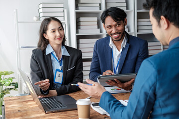 Colleagues meeting discuss business project planning, marketing strategies, and financial report analysis for business investment planning.