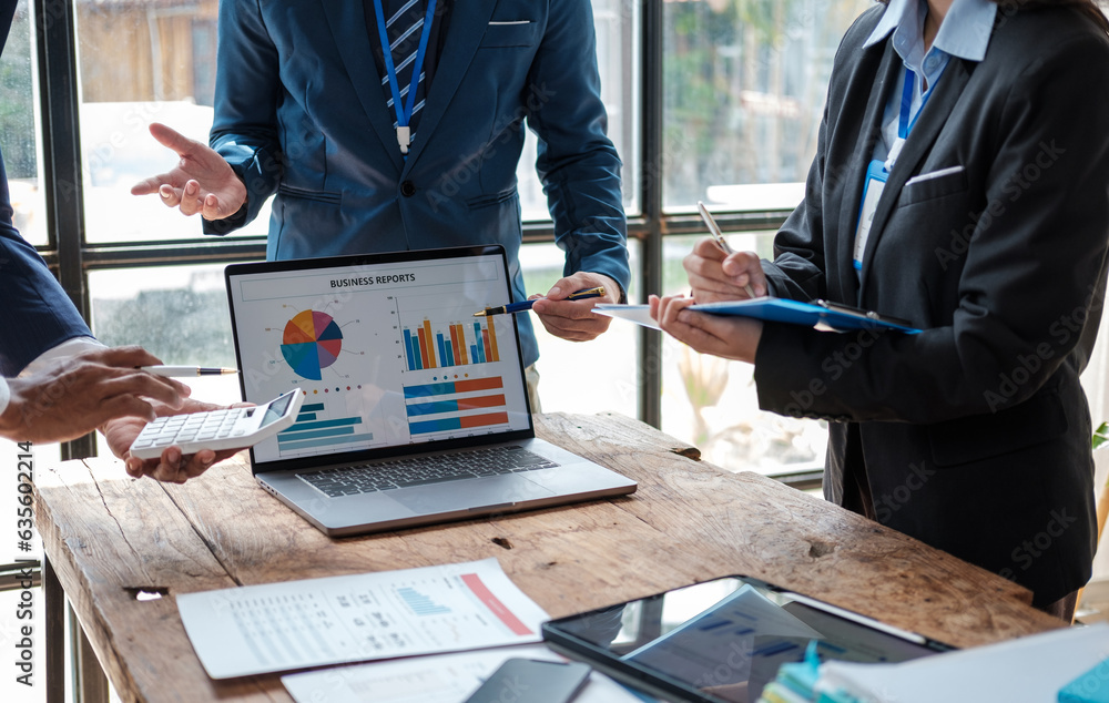 Poster business team analyzing income charts and graphs with modern laptop computer. business analysis and 