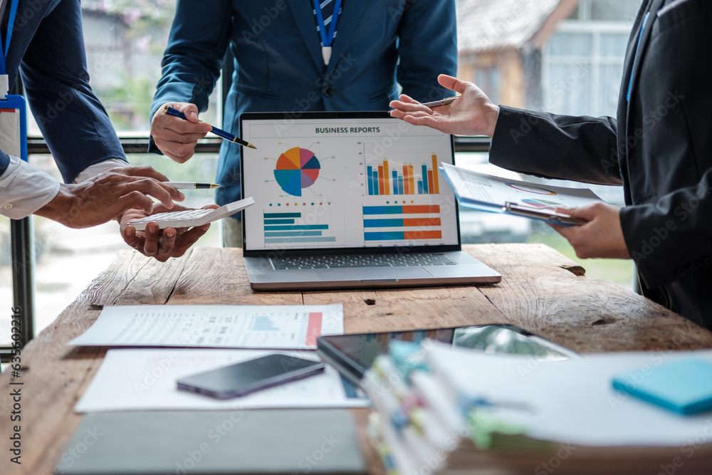 Poster business team analyzing income charts and graphs with modern laptop computer. business analysis and 