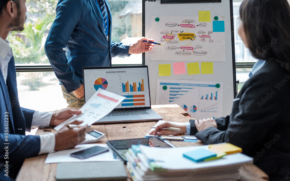 Poster business team analyzing income charts and graphs with modern laptop computer. business analysis and 