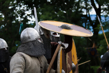 Viking battle with warriors from early middle ages.