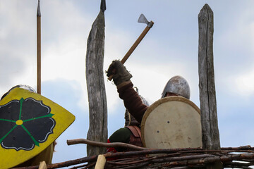 Viking battle with warriors from early middle ages.