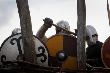 Viking battle with warriors from early middle ages.