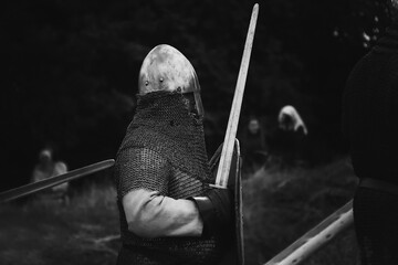 Viking battle with warriors from early middle ages.