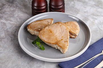 Roasted red tuna steak in the plate