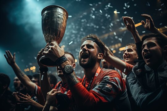 A scene of pure elation unfolds as soccer players raise the coveted championship trophy high above their heads, basking in the glory of their triumph in football finals