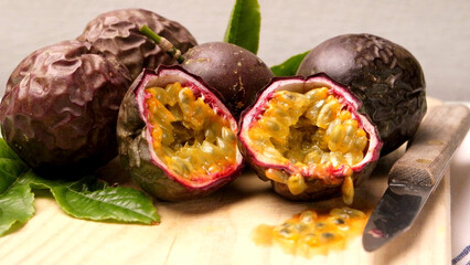 Passion fruits on wooden tray