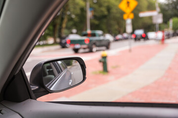 Car mirror: Reflection of journey, introspection, and transitions in a compact frame, capturing the...