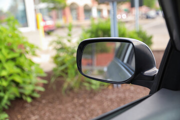 Car mirror: Reflection of journey, introspection, and transitions in a compact frame, capturing the road of life