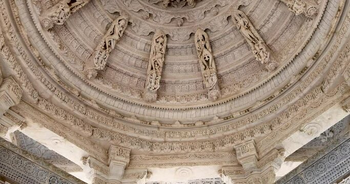 Historic Jain temple detail ceiling architecture in Ranakpur, Rajasthan, India. Built in 1496.