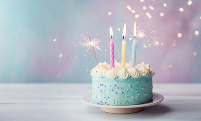 Pastel birthday cake with birthday candles and sparkler