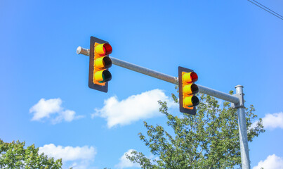 Illuminating pathways and guiding traffic, street lights and traffic lights symbolize safety,...