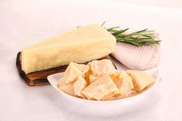 Chopped Italian hard parmesan cheese