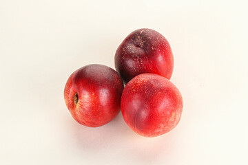 Ripe sweet juicy nectarines heap