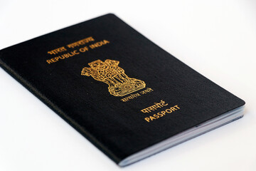 indian national blue passport on a white background in close up