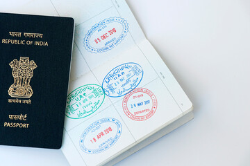 UAE visa stamping, united arab emirates and indian official stamps on a passport page, letters...