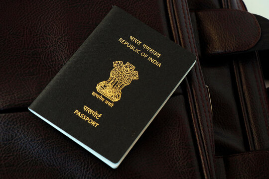 indian national passport on a traveling bag in close up