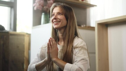 Portrait of relaxed young woman meditate and breathe slowly while make yoga asanas at cozy home Calm inspired female with closed eyes take break while resting for peaceful mind alone