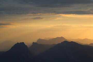 Sigriswiler Rothorn and other mountains at sunrise.