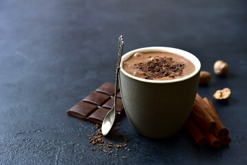 Spicy hot chocolate with ingredients for making.