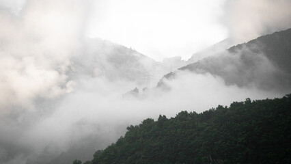 Mountains are covered in clouds